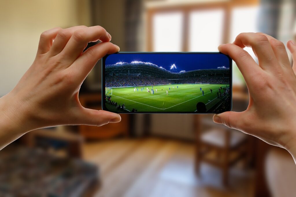 Watching football game at home via smartphone