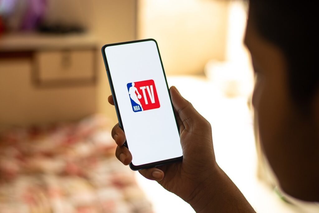 NBA logo on a phone screen.